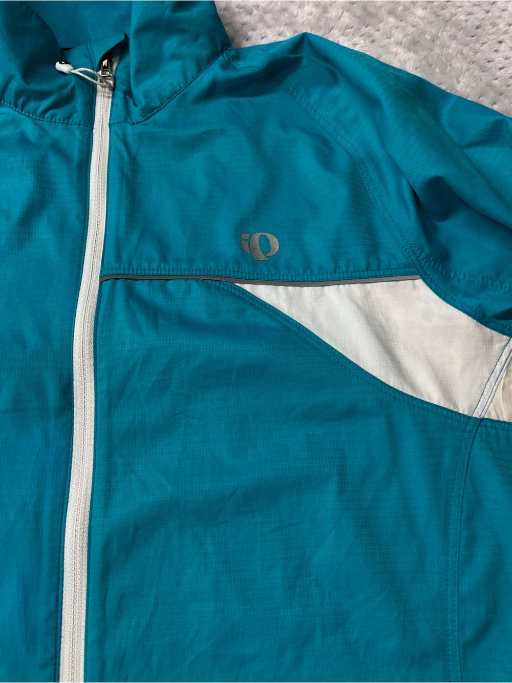 Pearl Izumi Turquoise and White Women bike jacket